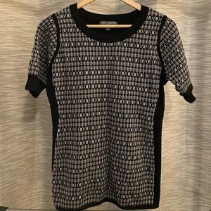 Quarter sleeve, business casual maternity shirt.